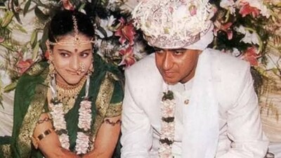 Kajol has always preferred to keep her clothes simple and for her wedding, she chose a dark green saree with a golden border. She looked like a quintessential Maharashtrian bride. She completed her outfit with a classic gold choker, matching earrings and green and gold bangles that complemented her wedding attire perfectly. (Pinterest) Kajol has always preferred to keep her clothes simple and for her wedding, she chose a dark green saree with a golden border. She looked like a quintessential Maharashtrian bride. She completed her outfit with a classic gold choker, matching earrings and green and gold bangles that complemented her wedding attire perfectly. (Pinterest)