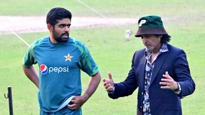 Pakistan captain Babar Azam and former Pakistani cricketer Ramiz Raja in a conversation during a practice session (Bibhash Lodh) Pakistan captain Babar Azam and former Pakistani cricketer Ramiz Raja in a conversation during a practice session (Bibhash Lodh)