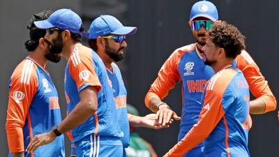 India's Kuldeep Yadav and teammates celebrate a dismissal during the Super 8 Group 1 match against Bangladesh in the ICC Mens T20 World Cup 2024, at Sir Vivian Richards Stadium in Antigua (ANI) India's Kuldeep Yadav and teammates celebrate a dismissal during the Super 8 Group 1 match against Bangladesh in the ICC Mens T20 World Cup 2024, at Sir Vivian Richards Stadium in Antigua (ANI)