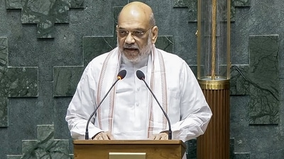 Two-time Union home minister Amit Shah takes oath as an MP from Gandhinagar constituency in Gujarat. (ANI)
