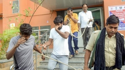 Economic Offences Unit officials leave with the accused arrested in the NEET paper leak case, in Patna, on Sunday. (PTI) Economic Offences Unit officials leave with the accused arrested in the NEET paper leak case, in Patna, on Sunday. (PTI)