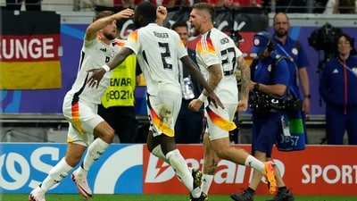 Germany's Niclas Fuellkrug, left, celebrates with teammates after scoring his side's first goal during a Group A match between Switzerland and Germany at the Euro 2024 soccer tournament in Frankfurt, Germany, Sunday, (AP) Germany's Niclas Fuellkrug, left, celebrates with teammates after scoring his side's first goal during a Group A match between Switzerland and Germany at the Euro 2024 soccer tournament in Frankfurt, Germany, Sunday, (AP)
