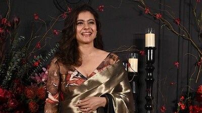 Bollywood actor Kajol poses for photographs during the wedding reception of Sonakshi Sinha and Zaheer Iqbal. Inside videos showed Kajol hugging Sonakshi and grooving with her at the party. (AFP) Bollywood actor Kajol poses for photographs during the wedding reception of Sonakshi Sinha and Zaheer Iqbal. Inside videos showed Kajol hugging Sonakshi and grooving with her at the party. (AFP)