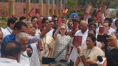 Amid the controversy over the appointment of the pro-tem speaker, several leaders of the Opposition INDIA bloc staged a protest in front of the Gandhi statue in the Parliament, holding copies of the Constitution. (HT Photo)