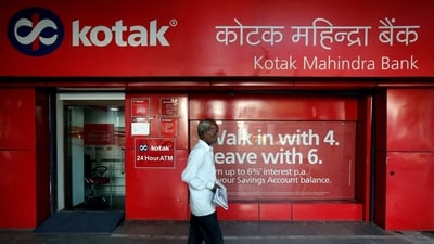 A man walks past the Kotak Mahindra Bank branch in New Delhi, India. (Reuters)
