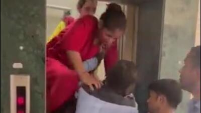 Residents said they were startled by screams coming from the lift, as they checked, they saw that two women were stuck in the lift, who urged them to fetch security guards to help them exit the lift. (HT Photo) Residents said they were startled by screams coming from the lift, as they checked, they saw that two women were stuck in the lift, who urged them to fetch security guards to help them exit the lift. (HT Photo)