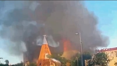 This photo taken from video released by Golos Dagestana shows smoke rises following an attack in Makhachkala, republic of Dagestan, Russia (AP) This photo taken from video released by Golos Dagestana shows smoke rises following an attack in Makhachkala, republic of Dagestan, Russia (AP)