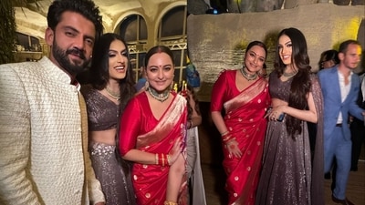 Sonakshi Sinha and Zaheer Iqbal pose for a photograph with Sushant Divgikr at their wedding reception in Mumbai. (Instagram/@sushantdivgikr) Sonakshi Sinha and Zaheer Iqbal pose for a photograph with Sushant Divgikr at their wedding reception in Mumbai. (Instagram/@sushantdivgikr)