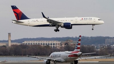 An American Airlines aircraft taxis as a Delta Air Lines aircraft lands at Reagan National Airport in Arlington, Virginia, U.S. REUTERS/Joshua Roberts/File Photo (REUTERS)