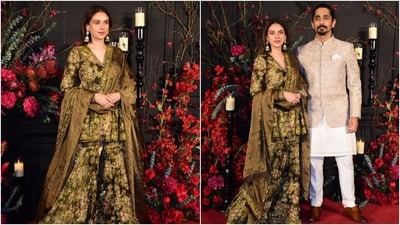 Aditi Rao Hydari and Siddharth also attended Sonakshi and Zaheer's wedding reception. Aditi chose a mehendi green-coloured velvet sharara set adorned in gorgeous pink floral embellishments. The ensemble is from the clothing label Prints By Radhika. Siddharth complemented her in an embroidered bandhgala jacket, white Chikankari kurta and pants set. (HT Photo/Varinder Chawla) Aditi Rao Hydari and Siddharth also attended Sonakshi and Zaheer's wedding reception. Aditi chose a mehendi green-coloured velvet sharara set adorned in gorgeous pink floral embellishments. The ensemble is from the clothing label Prints By Radhika. Siddharth complemented her in an embroidered bandhgala jacket, white Chikankari kurta and pants set. (HT Photo/Varinder Chawla)