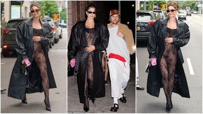 Hailey Bieber turns heads in a striking black catsuit, showcasing her growing baby bump with style during a recent outing with Justin. (Instagram) Hailey Bieber turns heads in a striking black catsuit, showcasing her growing baby bump with style during a recent outing with Justin. (Instagram)