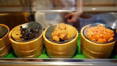 Some onigiri ingredients are seen at the display case at Onigiri Asakusa Yadoroku, Tokyo's oldest onigiri restaurant. (AP ) Some onigiri ingredients are seen at the display case at Onigiri Asakusa Yadoroku, Tokyo's oldest onigiri restaurant. (AP )