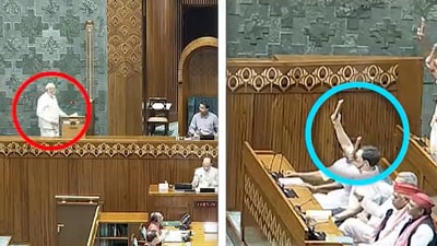 Opposition benches show Constitution copy to Prime Minister Narendra Modi in Parliament.