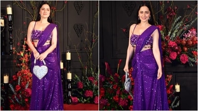 At the party, Heeramandi actor Sanjeeda Sheikh looked stunning in a purple sequinned pre-draped saree and a heavily embellished bralette-styled blouse. She carried an embellished heart-shaped clutch with the ensemble. (HT Photo/Varinder Chawla) At the party, Heeramandi actor Sanjeeda Sheikh looked stunning in a purple sequinned pre-draped saree and a heavily embellished bralette-styled blouse. She carried an embellished heart-shaped clutch with the ensemble. (HT Photo/Varinder Chawla)