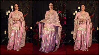 Tabu chose a mauve pink-coloured brocade and gota embroidered sharara suit for Sonakshi Sinha and Zaheer Iqbal's wedding reception. She styled the traditional ensemble with minimal makeup, jhumkis, and Kolhapuri sandals. (HT Photo/Varinder Chawla) Tabu chose a mauve pink-coloured brocade and gota embroidered sharara suit for Sonakshi Sinha and Zaheer Iqbal's wedding reception. She styled the traditional ensemble with minimal makeup, jhumkis, and Kolhapuri sandals. (HT Photo/Varinder Chawla)