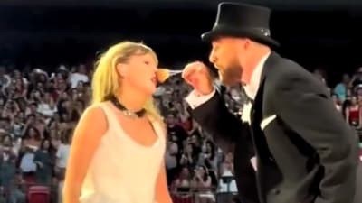Travis Kelce brushes Taylor's nose for a special performance at the Eras Tour. Travis Kelce brushes Taylor's nose for a special performance at the Eras Tour.