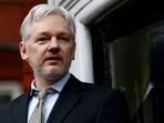 FILE PHOTO: WikiLeaks founder Julian Assange makes a speech from the balcony of the Ecuadorian Embassy in central London, Britain February 5, 2016.  REUTERS/Peter Nicholls/File Photo