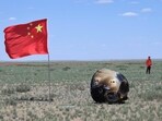 In this photo released by Xinhua News Agency, the return capsule of the Chang'e 6 probe is seen in Siziwang Banner, northern China's Inner Mongolia Autonomous Region on Tuesday In this photo released by Xinhua News Agency, the return capsule of the Chang'e 6 probe is seen in Siziwang Banner, northern China's Inner Mongolia Autonomous Region on Tuesday