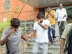 Economic Offences Unit officials leave with the accused arrested in the NEET paper leak case, in Patna, on Sunday. Sanjiv Mukhia is still absconding. (PTI) Economic Offences Unit officials leave with the accused arrested in the NEET paper leak case, in Patna, on Sunday. Sanjiv Mukhia is still absconding. (PTI)