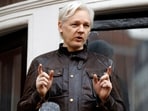 Julian Assange speaks to the media outside the Ecuadorian embassy in London, May 19, 2017. Assange will plead guilty to a felony charge in a deal with the U.S. Justice Department that will free him from prison and resolve a long-running legal saga over the publication of a trove of classified documents. (AP Photo/Frank Augstein, File) Julian Assange speaks to the media outside the Ecuadorian embassy in London, May 19, 2017. Assange will plead guilty to a felony charge in a deal with the U.S. Justice Department that will free him from prison and resolve a long-running legal saga over the publication of a trove of classified documents. (AP Photo/Frank Augstein, File)