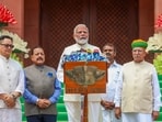 Prime Minister Narendra Modi along with union parliamentary affairs minister Kiren Rijiju and others outside the Parliament. 