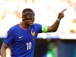 France's Kylian Mbappe reacts during the match
