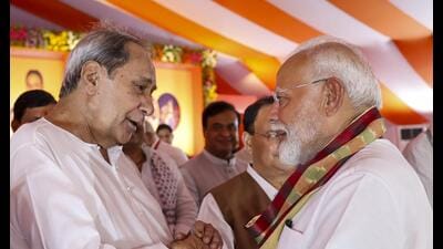 **EDS: IMAGE VIA PMO** Bhubaneswar: Prime Minister Narendra Modi being greeted by former Odisha chief minister Naveen Patnaik during the swearing-in ceremony of new Odisha government, in Bhubaneswar, Wednesday, June 12, 2024. (PTI Photo)(PTI06_12_2024_000281B) (PTI) **EDS: IMAGE VIA PMO** Bhubaneswar: Prime Minister Narendra Modi being greeted by former Odisha chief minister Naveen Patnaik during the swearing-in ceremony of new Odisha government, in Bhubaneswar, Wednesday, June 12, 2024. (PTI Photo)(PTI06_12_2024_000281B) (PTI)