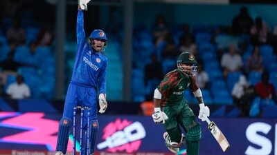 Afghanistan wicketkeeper Mohammad Ishaq appeals as Bangladesh's Litton Das runs during the men's T20 World Cup cricket match between Afghanistan and Bangladesh at Arnos Vale Ground, Kingstown, (AP) Afghanistan wicketkeeper Mohammad Ishaq appeals as Bangladesh's Litton Das runs during the men's T20 World Cup cricket match between Afghanistan and Bangladesh at Arnos Vale Ground, Kingstown, (AP)