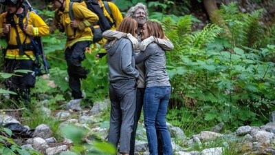 In this photo provided by SLV Steve, lost hiker Lukas McClish, 34, is reunited with his family on Thursday, June 20, 2024, in the rural community of Boulder Creek, Calif. McClish, who went missing for 10 days, was found safe in the mountains in Northern California, authorities said. (SLV Steve via AP) (AP) In this photo provided by SLV Steve, lost hiker Lukas McClish, 34, is reunited with his family on Thursday, June 20, 2024, in the rural community of Boulder Creek, Calif. McClish, who went missing for 10 days, was found safe in the mountains in Northern California, authorities said. (SLV Steve via AP) (AP)