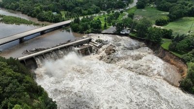Heavy rains cause high water levels at the Rapidan Dam near Mankato, Minn., Monday, June 24, 2024. Officials say the dam is threatened with “imminent failure.” (AP Photo/Mark Vancleave) (AP) Heavy rains cause high water levels at the Rapidan Dam near Mankato, Minn., Monday, June 24, 2024. Officials say the dam is threatened with “imminent failure.” (AP Photo/Mark Vancleave) (AP)