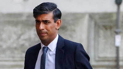 Britain's prime minister Rishi Sunak walks outside 10 Downing Street in London. (Reuters)