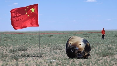 In this photo released by Xinhua News Agency, the return capsule of the Chang'e 6 probe is seen in Siziwang Banner, northern China's Inner Mongolia Autonomous Region on Tuesday (AP) In this photo released by Xinhua News Agency, the return capsule of the Chang'e 6 probe is seen in Siziwang Banner, northern China's Inner Mongolia Autonomous Region on Tuesday (AP)