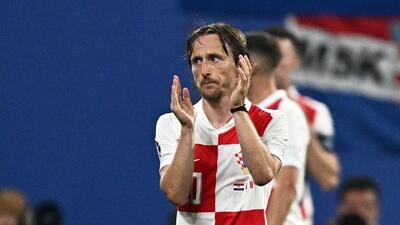 Croatia's midfielder Luka Modric leaves the pitch after being substituted against Italy on Monday. (AFP)