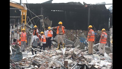 Haryana State Disaster Response Force (SDRF) staff and police personnel conduct a search and rescue operation at the blast site at Daulatabad Industrial Area near Dwarka Expressway in Gurugram on Saturday. (HT PHOTO) Haryana State Disaster Response Force (SDRF) staff and police personnel conduct a search and rescue operation at the blast site at Daulatabad Industrial Area near Dwarka Expressway in Gurugram on Saturday. (HT PHOTO)