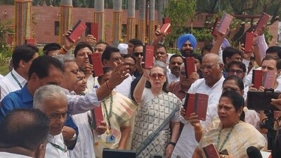 Amid the controversy over the appointment of the pro-tem speaker, several leaders of the Opposition INDIA bloc staged a protest in front of the Gandhi statue in the Parliament, holding copies of the Constitution. (HT Photo) Amid the controversy over the appointment of the pro-tem speaker, several leaders of the Opposition INDIA bloc staged a protest in front of the Gandhi statue in the Parliament, holding copies of the Constitution. (HT Photo)