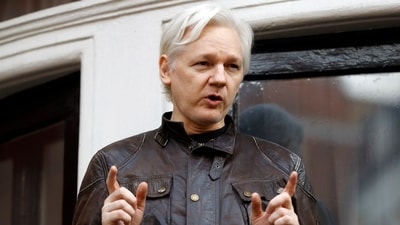 Julian Assange speaks to the media outside the Ecuadorian embassy in London, May 19, 2017. Assange will plead guilty to a felony charge in a deal with the U.S. Justice Department that will free him from prison and resolve a long-running legal saga over the publication of a trove of classified documents. (AP Photo/Frank Augstein, File) (AP) Julian Assange speaks to the media outside the Ecuadorian embassy in London, May 19, 2017. Assange will plead guilty to a felony charge in a deal with the U.S. Justice Department that will free him from prison and resolve a long-running legal saga over the publication of a trove of classified documents. (AP Photo/Frank Augstein, File) (AP)