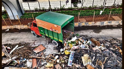 Mumbai, India. June 25, 2024: BMC collected the trash and abandoned vehicles from Govandi and Shivaji Nagar area of M ward and dumped them under Amar Mahal Flyover, Where the major fire broke out in abandoned vehicles. June 25, 2024. (Photo by Raju Shinde/HT Photo)