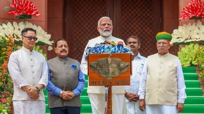 Prime Minister Narendra Modi along with union parliamentary affairs minister Kiren Rijiju and others outside the Parliament. (PTI file photo) Prime Minister Narendra Modi along with union parliamentary affairs minister Kiren Rijiju and others outside the Parliament. (PTI file photo)