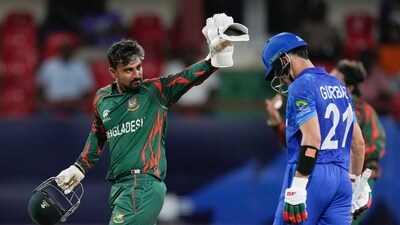 Bangladesh wicketkeeper Litton Das gestures as Afghanistan's Rahmanullah Gurbaz reacts during the men's T20 World Cup cricket match between Afghanistan and Bangladesh at Arnos Vale Ground (AP) Bangladesh wicketkeeper Litton Das gestures as Afghanistan's Rahmanullah Gurbaz reacts during the men's T20 World Cup cricket match between Afghanistan and Bangladesh at Arnos Vale Ground (AP)
