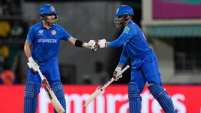 Afghanistan's Rahmanullah Gurbaz, left, and teammate Azmatullah Omarzai gesture to each other during the men's T20 World Cup cricket match between Afghanistan and Bangladesh at Arnos Vale Ground, Kingstown (AP) Afghanistan's Rahmanullah Gurbaz, left, and teammate Azmatullah Omarzai gesture to each other during the men's T20 World Cup cricket match between Afghanistan and Bangladesh at Arnos Vale Ground, Kingstown (AP)
