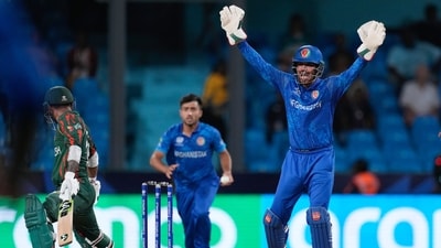 Afghanistan wicketkeeper Mohammad Ishaq appeals unsuccessfully for the wicket of Bangladesh's Litton Das, left, during the men's T20 World Cup cricket match between Afghanistan and Bangladesh at Arnos Vale Ground (AP) Afghanistan wicketkeeper Mohammad Ishaq appeals unsuccessfully for the wicket of Bangladesh's Litton Das, left, during the men's T20 World Cup cricket match between Afghanistan and Bangladesh at Arnos Vale Ground (AP)