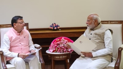 Uttarakhand chief minister Pushkar Singh Dhami with Prime Minister Narendra Modi. Uttarakhand chief minister Pushkar Singh Dhami with Prime Minister Narendra Modi.