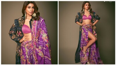 Shriya Saran gave us fresh inspiration on what to do with our mom's old sarees. she paired a printed skirt with a pink bralette and a green jacket with traditional patchwork embroidery. 