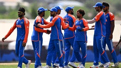 India players congratulate each other after defeating Australia in the T20 World Cup 2024 Super Eight cricket match. (AFP) India players congratulate each other after defeating Australia in the T20 World Cup 2024 Super Eight cricket match. (AFP)