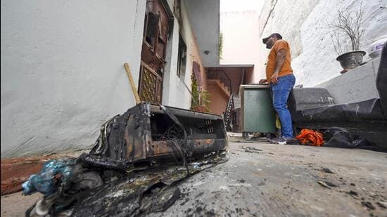 A view of the first-floor residence and the inverter that sparked the fire. (Sanjeev Verma/HT Photo)