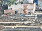 The damaged stairs of Banganga Tank. (Photo by Anshuman Poyrekar/ Hindustan Times) (Hindustan Times) The damaged stairs of Banganga Tank. (Photo by Anshuman Poyrekar/ Hindustan Times) (Hindustan Times)