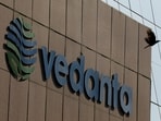 A bird flies past the logo of Vedanta installed on the facade of its headquarters in Mumbai (Danish Siddiqui/Reuters)