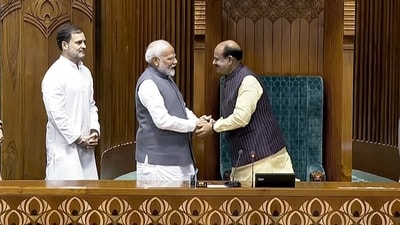 Prime Minister Narendra Modi with newly elected Lok Sabha speaker Om Birla as he accompanies him to the chair, at Parliament House in New Delhi on Wednesday. LOP Rahul Gandhi and Union minister Kiren Rijiju accompany him to the chair (Sansad TV) Prime Minister Narendra Modi with newly elected Lok Sabha speaker Om Birla as he accompanies him to the chair, at Parliament House in New Delhi on Wednesday. LOP Rahul Gandhi and Union minister Kiren Rijiju accompany him to the chair (Sansad TV)