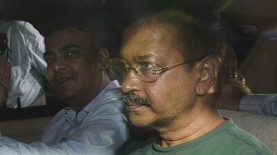 CBI officials leave with Delhi chief minister Arvind Kejriwal from Rouse Avenue Court after the court sent him to the probe agency custody in New Delhi on Wednesday. (PTI) CBI officials leave with Delhi chief minister Arvind Kejriwal from Rouse Avenue Court after the court sent him to the probe agency custody in New Delhi on Wednesday. (PTI)