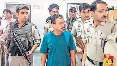 Delhi CM and Aam Aadmi Party (AAP) National Convenor Arvind Kejriwal being brought out of the courtroom for tea and biscuits after his sugar level dropped, at Rouse Avenue Court in New Delhi on Wednesday. (ANI)